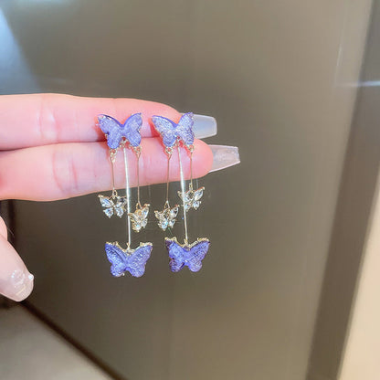 Pendientes mariposa🦋 de cristal borlados💎